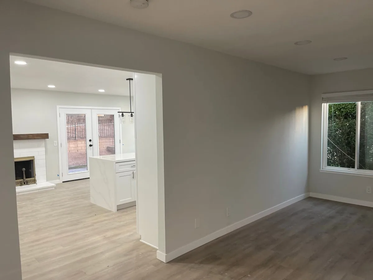 Freshly painted white walls in an open living room